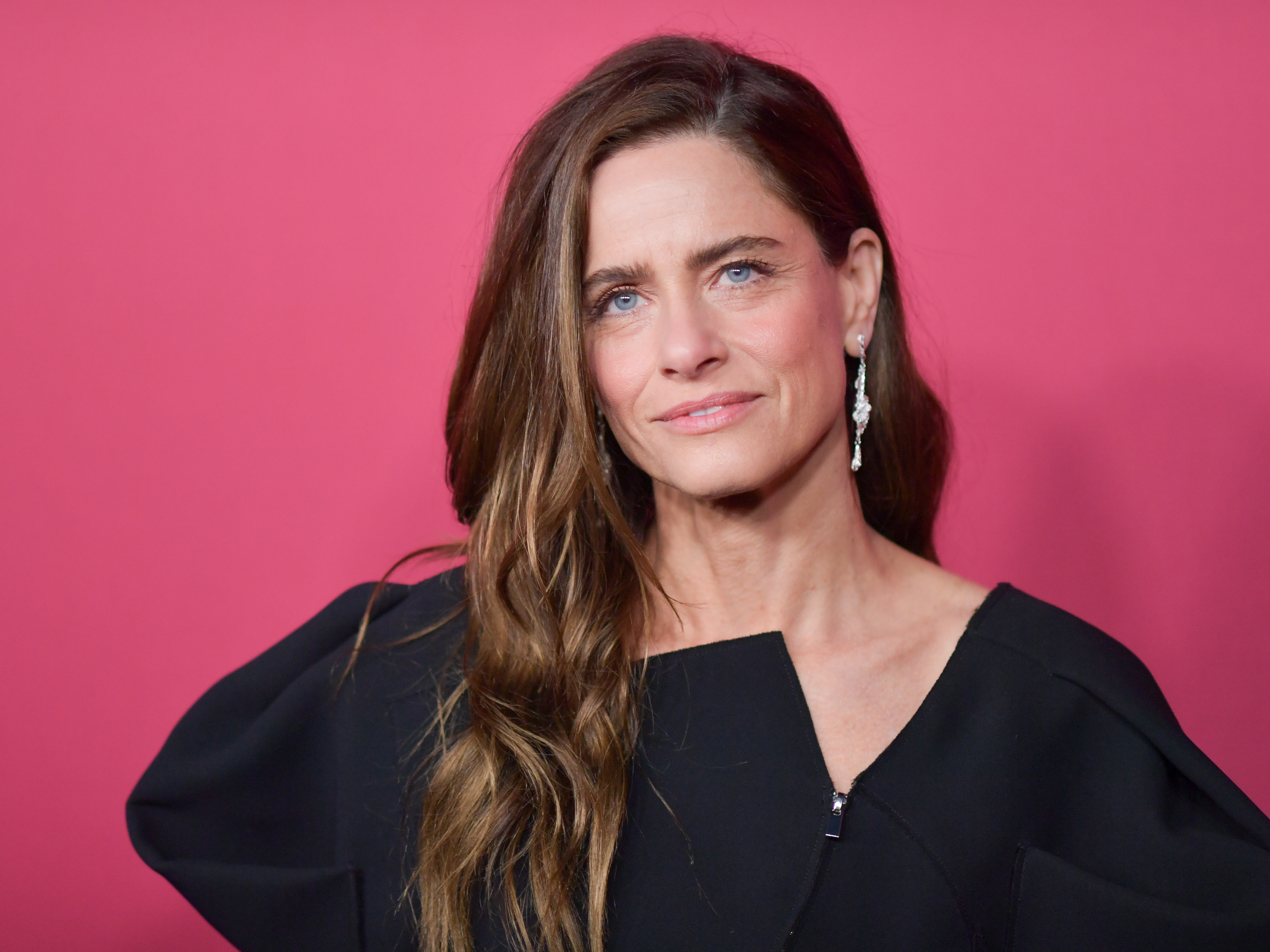 Amanda Peet arrives at the premiere of <em>All