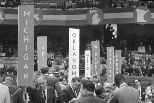General view of the delegates from different states sit and stand during the 1968 Democratic National Convention, held at the International Amphitheatre in Chicago, Aug. 28, 1968.