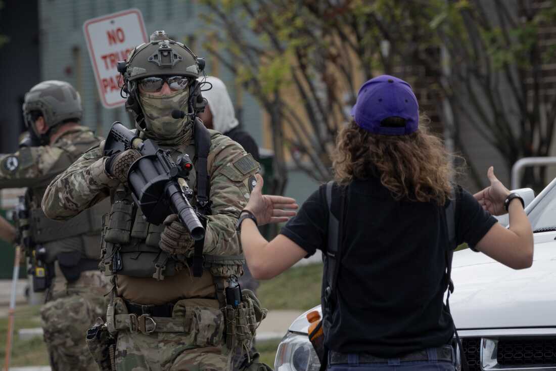 Federal law enforcement agents confront demonstrators protesting outside of an immigration processing center on Sept. 19, 2025, in Broadview, Ill. The demonstrators were protesting a recent surge in ICE activity in the Chicago area, part of the Trump administration's crackdown on undocumented immigrants in the area dubbed Operation Midway Blitz.