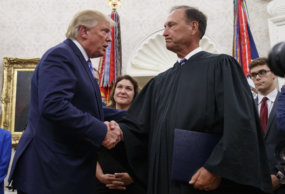 President Donald Trump shakes hands with Supreme Court Justice Samuel Alito after Mark Esper was sworn in as Secretary of Defense during a ceremony in the Oval Office at the White House in Washington, Tuesday, July 23, 2019.