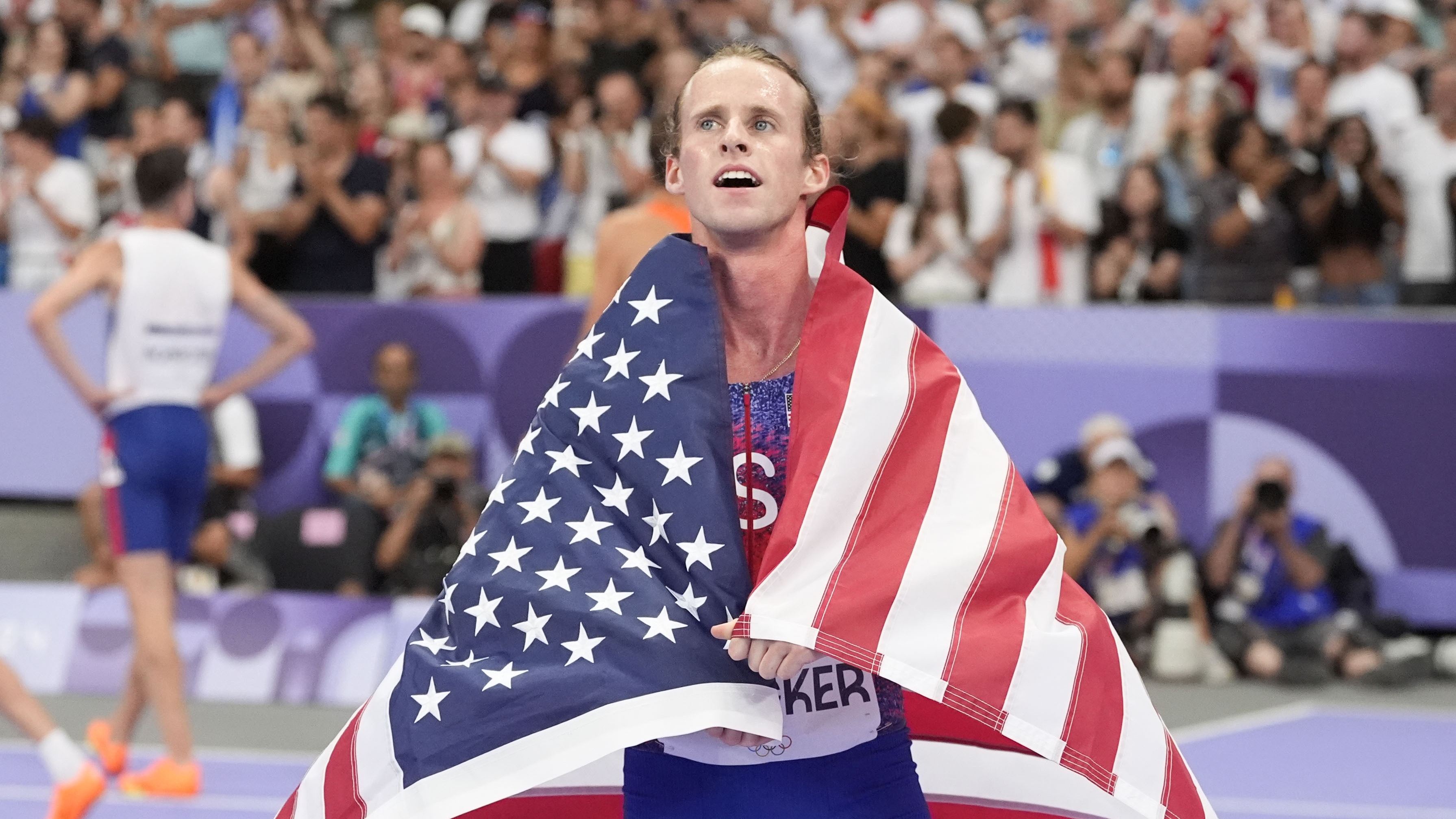Cole Hocker, of the United States, celebrates setting an Olympic record and winning the men's 1,500-meter final at the Paris Summer Olympics. (AP)