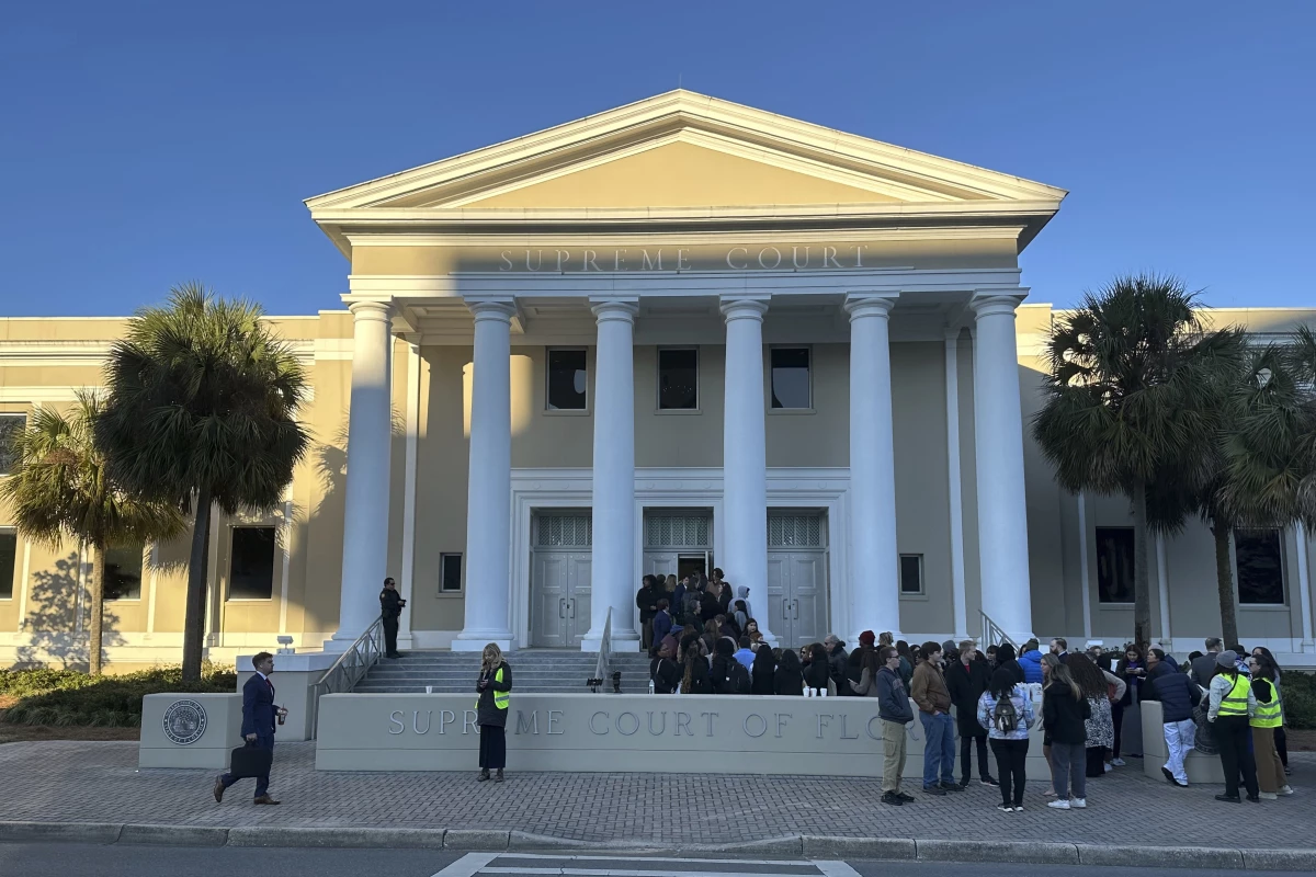 People gather outside the Florida Supreme Court in Tallahassee earlier this year. Voting rights groups challenging the state’s congressional map are counting on the court to reinstate a district that gave Black voters in the northern part of the state the opportunity to elect their candidate of choice.