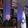 Israel's Defense Minister Yoav Gallant speaks during a ceremony marking the Hebrew calendar anniversary of the Hamas attack on October 7 last year that sparked the ongoing war in Gaza, at the Mount Herzl military cemetery in Jerusalem, Israel Sunday Oct. 27, 2024.