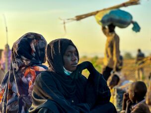 A displaced woman rests in Tawila, in the country's war-torn western Darfur region, on Oct. 28, 2025, after fleeing El Fasher following the city's fall to the Rapid Support Forces (RSF).