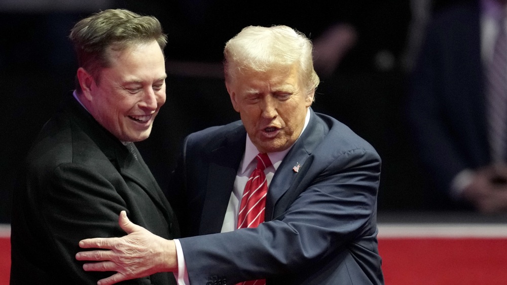 Elon Musk, left, and President-elect Donald Trump embrace at a rally ahead of the 60th Presidential Inauguration on Jan. 19, 2025, in Washington. (AP)