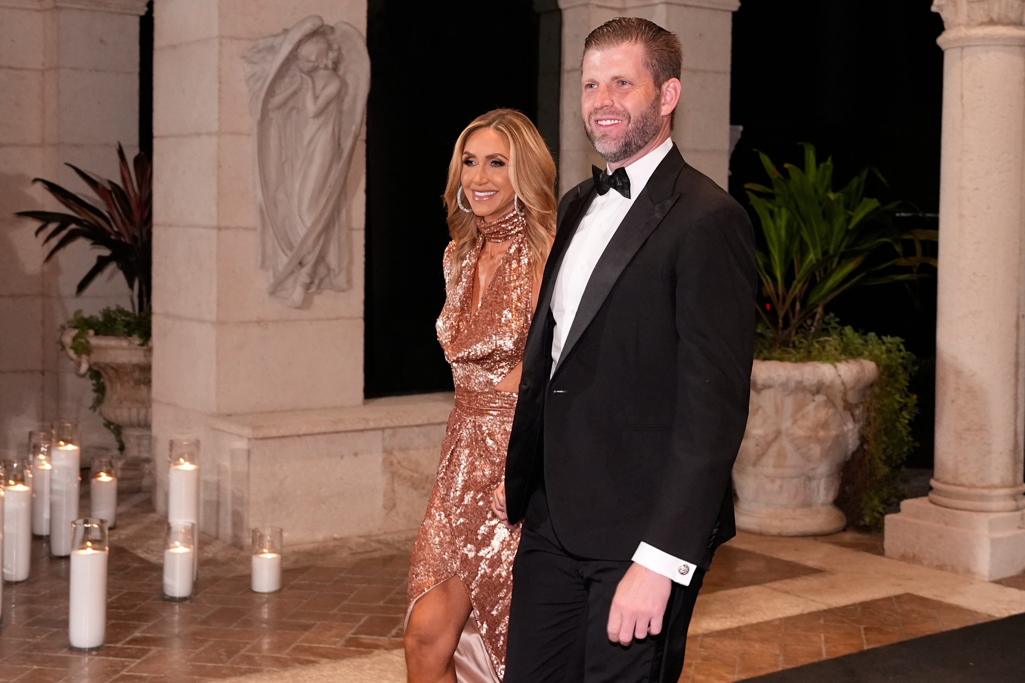 Eric Trump and Lara Trump arrive before President Donald Trump and first lady Melania Trump for a New Year