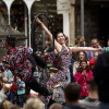 Street performers entertain passersby on the Royal Mile as crowds of entertainers and festival-goers gather for the Edinburgh Festival Fringe and Edinburgh International Festival in Edinburgh, Scotland, on Aug. 1, 2025. The Fringe, one of the world's largest performing arts festivals, features over 3,800 shows across 265 venues and draws an audience of roughly 3 million visitors.