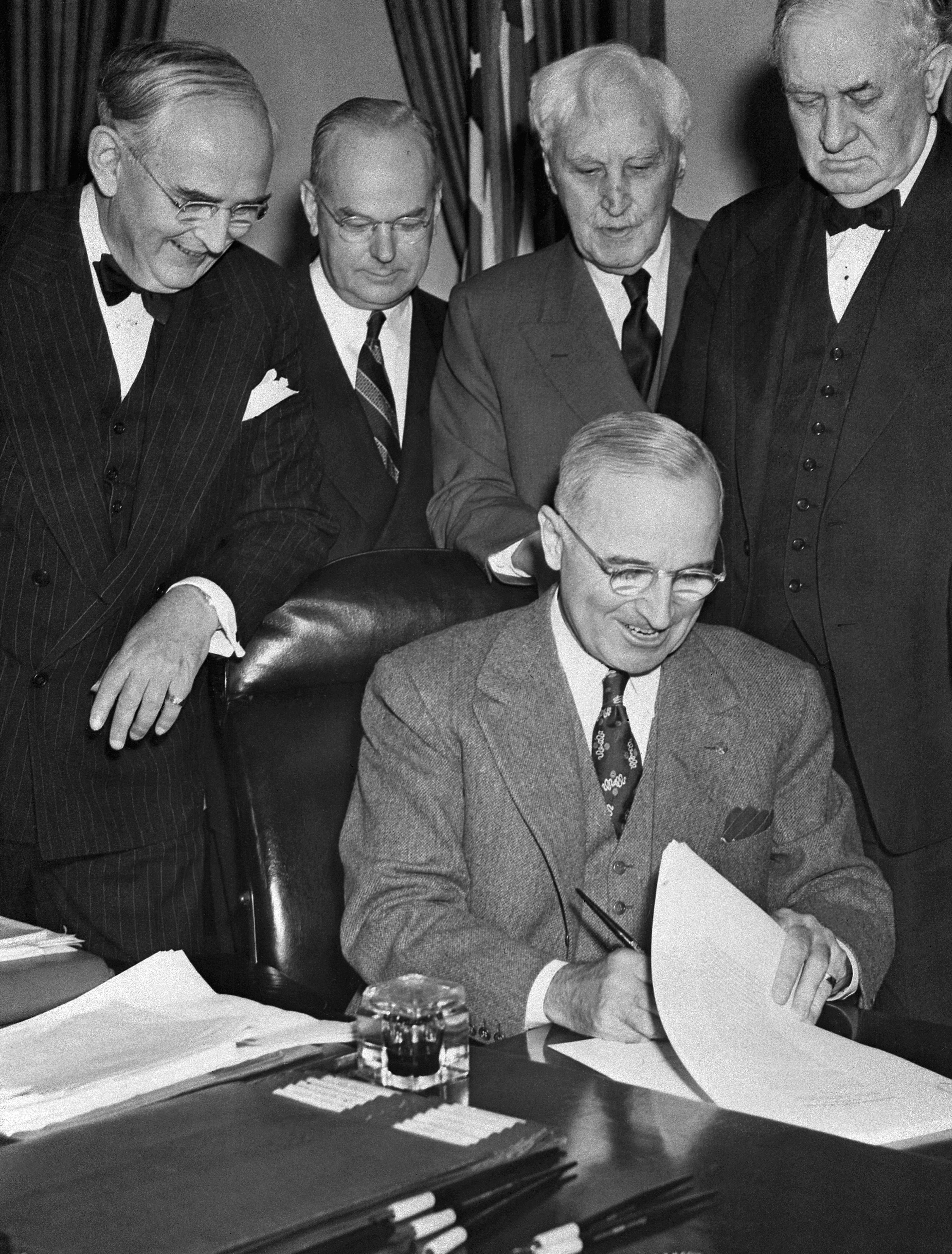 President Harry Truman signs the Marshall Plan on April 3, 1948 in Washington. The plan played a key role in the reconstruction of Europe after World War II and was part of the wide-ranging moves by the U.S. to establish a new international order that still defines the world to this day.