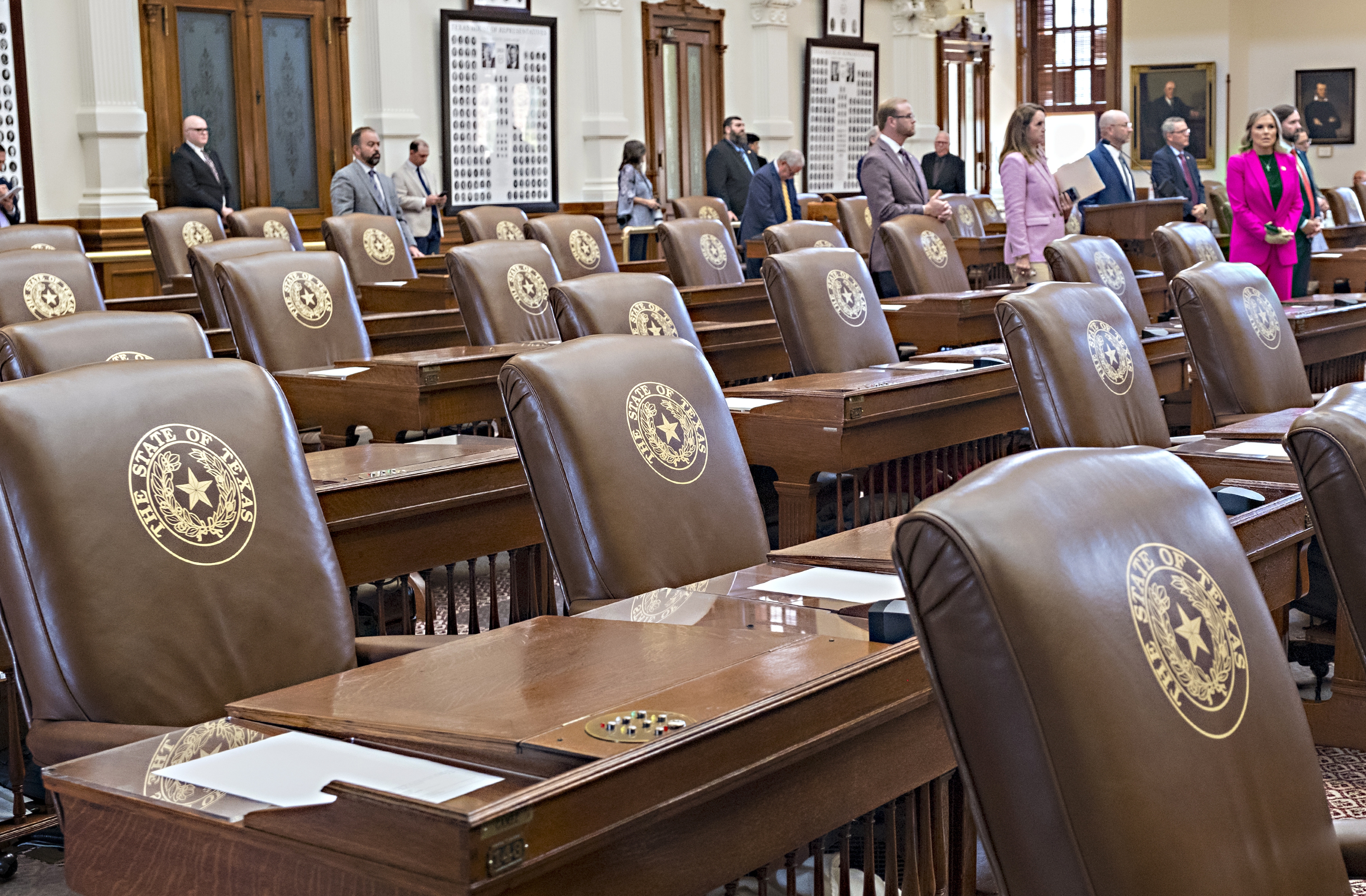 Chairs belonging to House Democrats remain empty during a session convocation in the State Capitol, Tuesday, Aug. 5, 2025, in Austin, Texas. (AP)