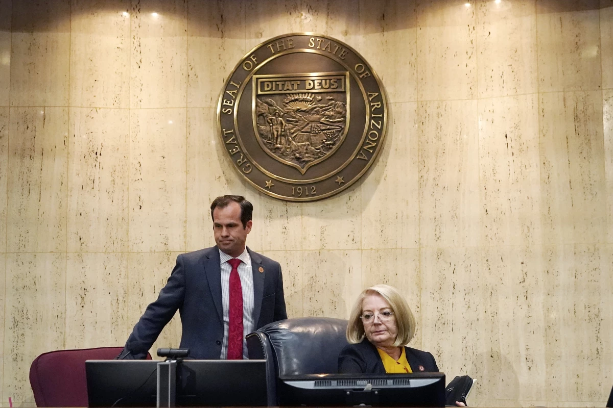 Then-Arizona state Senate President Karen Fann, right, is joined by then-Sen. Warren Petersen prior to a 2021 hearing on a review of the 2020 election results in Maricopa County.
