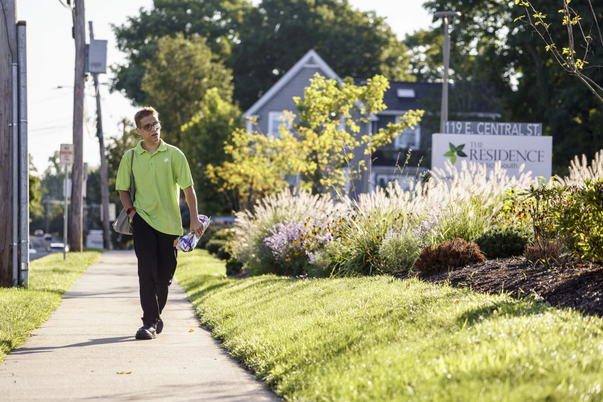 Jason Mazzola walks to work at The Residence at Natick South, an LCB Senior Living community in Natick, MA. August 22, 2024.