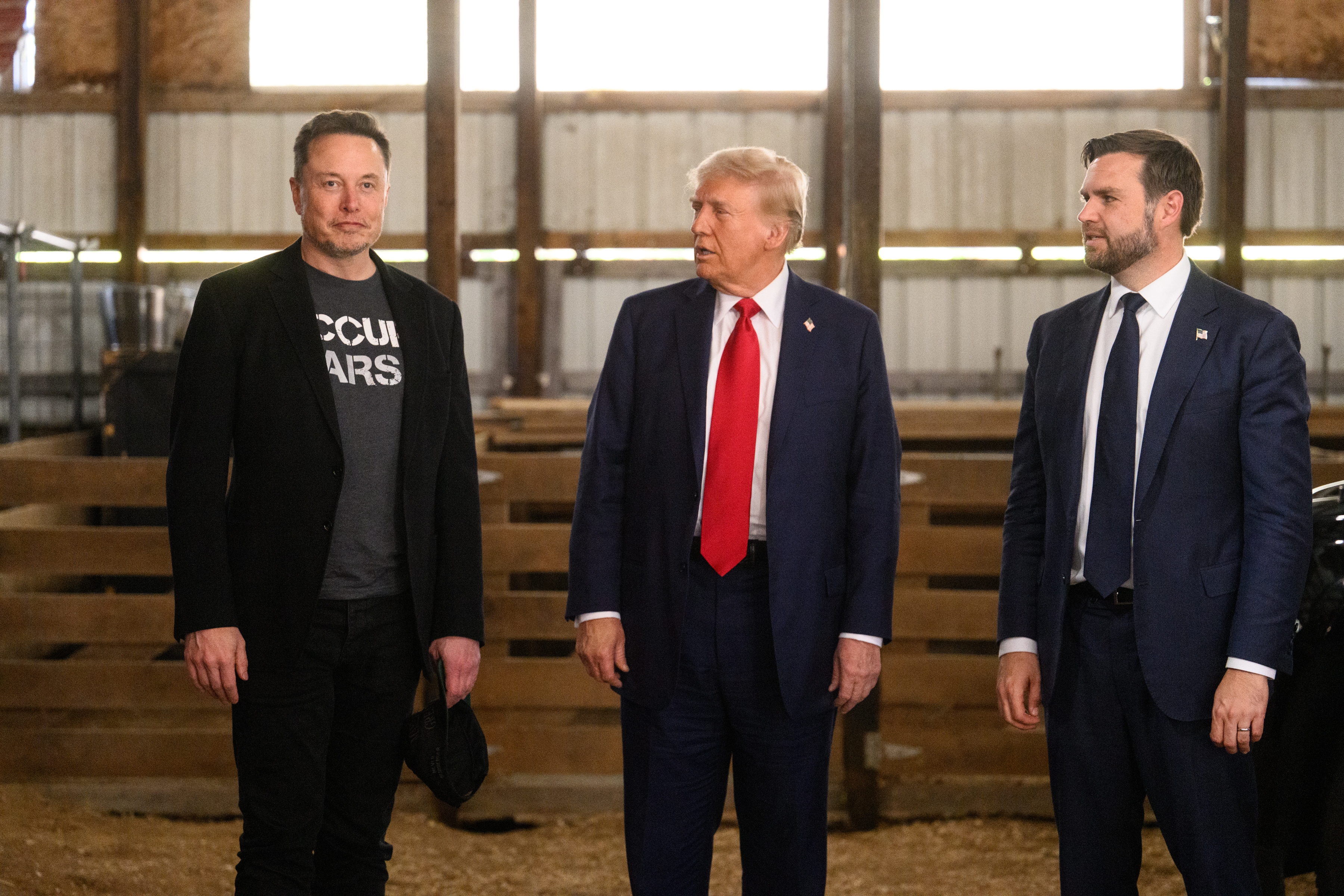 President Donald Trump, center, and Vice President JD Vance, right, and Elon Musk met backstage prior to a presidential campaign event at the Butler Farm Show in Butler, Pa., on Oct. 5, 2024.