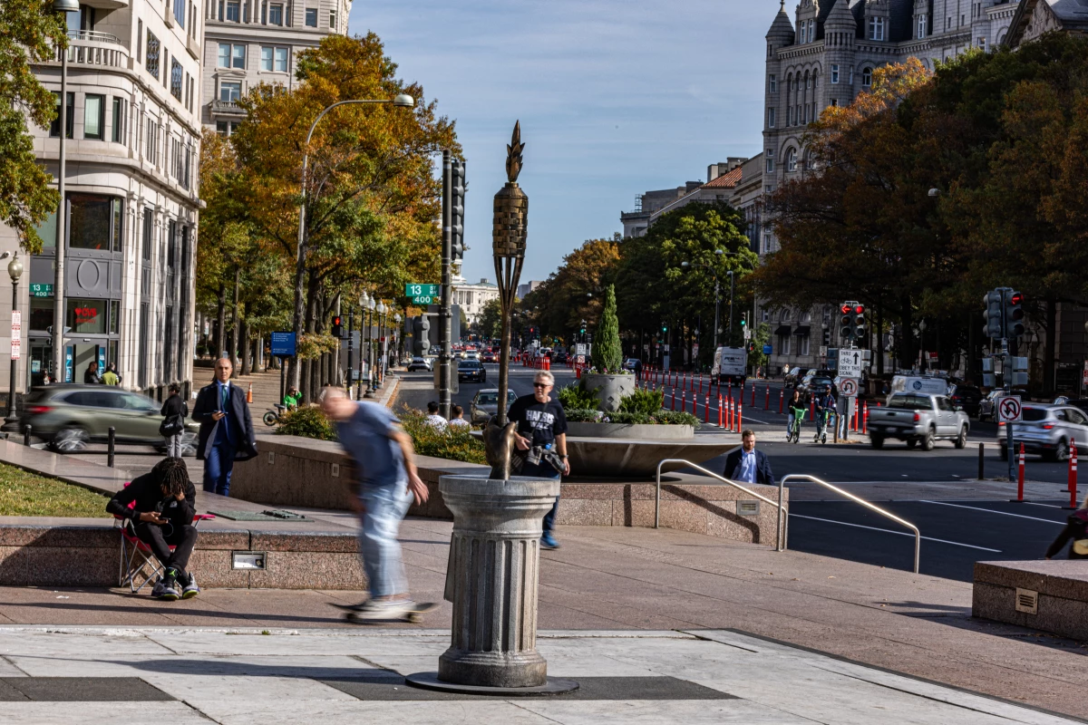 The tiki torch statue, called 'The Donald J. Trump Enduring Flame,' was deposited on D.C.'s Freedom Plaza on Monday.
