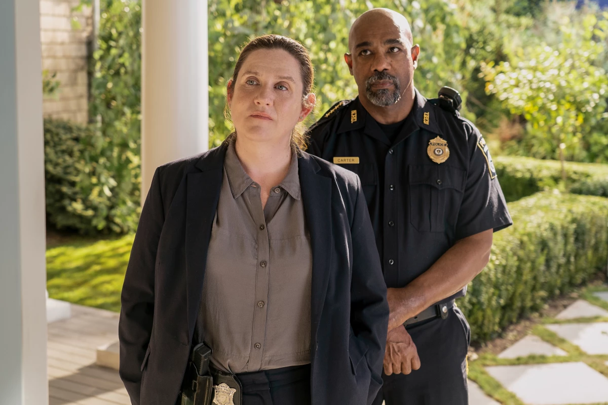 Donna Lynne Champlin, left, as Nikki Henry, and Michael Beach as Dan Carter.