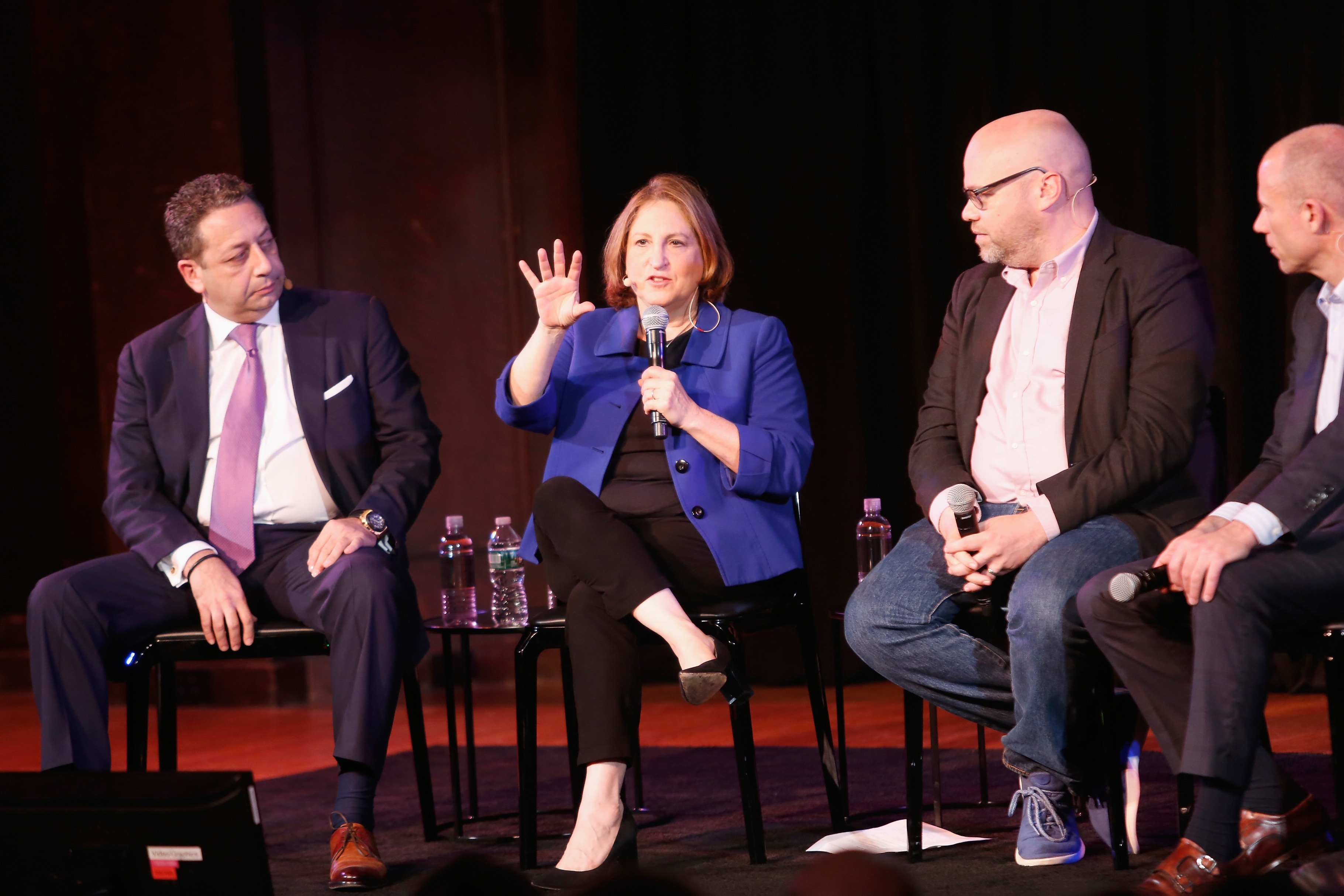 Washington Post columnist Ruth Marcus (in a blue jacket) speaks on stage during a panel at the New Yorker Festival in 2018.