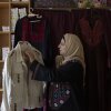Palestinian Hanan Zarura shows the embroidery on a jacket at Beit Atfal Assumoud, a nonprofit organization in the Palestinian refugee camp of Shatila, in Beirut, Lebanon, on Dec. 2, 2024.