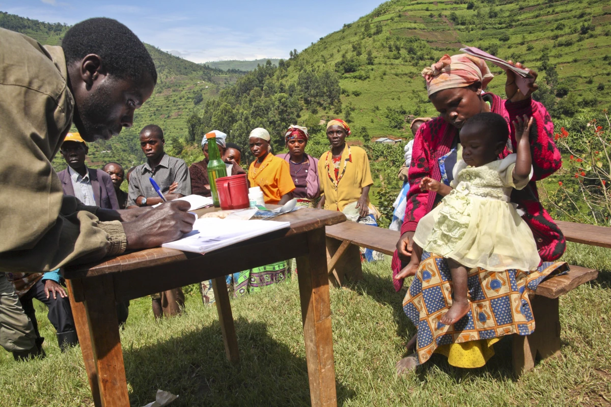 Ugandans in Kabale line up for treatment for river blindness, a 'neglected tropical disease' caused by a parasitic roundworm and transmitted by the bite of the black fly. The drug ivermectin, donated by a pharmaceutical company, kills the roundworm larvae. But now there's a freeze on the U.S. aid program that distributes the drug.