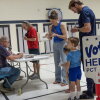 Voters at a polling place last month in Shelby, Mich. The U.S. has not ever attempted to create a comprehensive list of American citizens before this administration and maintaining voter lists is the responsibility of states — not the federal government, as the Constitution dictates that states control elections.