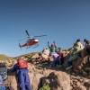 Residents of the isolated village of Mphooko wave as a team from the Lesotho Flying Doctor Service departs after a day treating patients in the village. Mphooko is inaccessible by road, and relies on the LFDS for basic medical care.