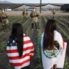 National Guard soldiers block protestors during an ICE immigration raid at a nearby cannabis farm on July 10 near Camarillo, California.