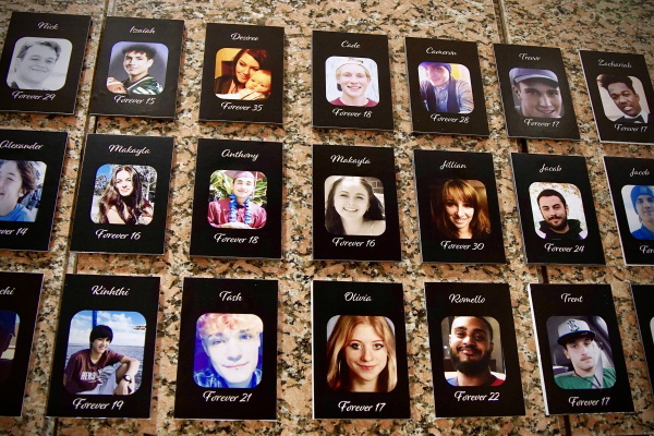 A photo of Makayla Cox, who died of a fentanyl overdose at age 16, is displayed among other portraits on "The Faces of Fentanyl" wall, which displays photos of Americans who died from a fentanyl overdose, at the Drug Enforcement Administration (DEA) headquarters in Arlington, Virginia.