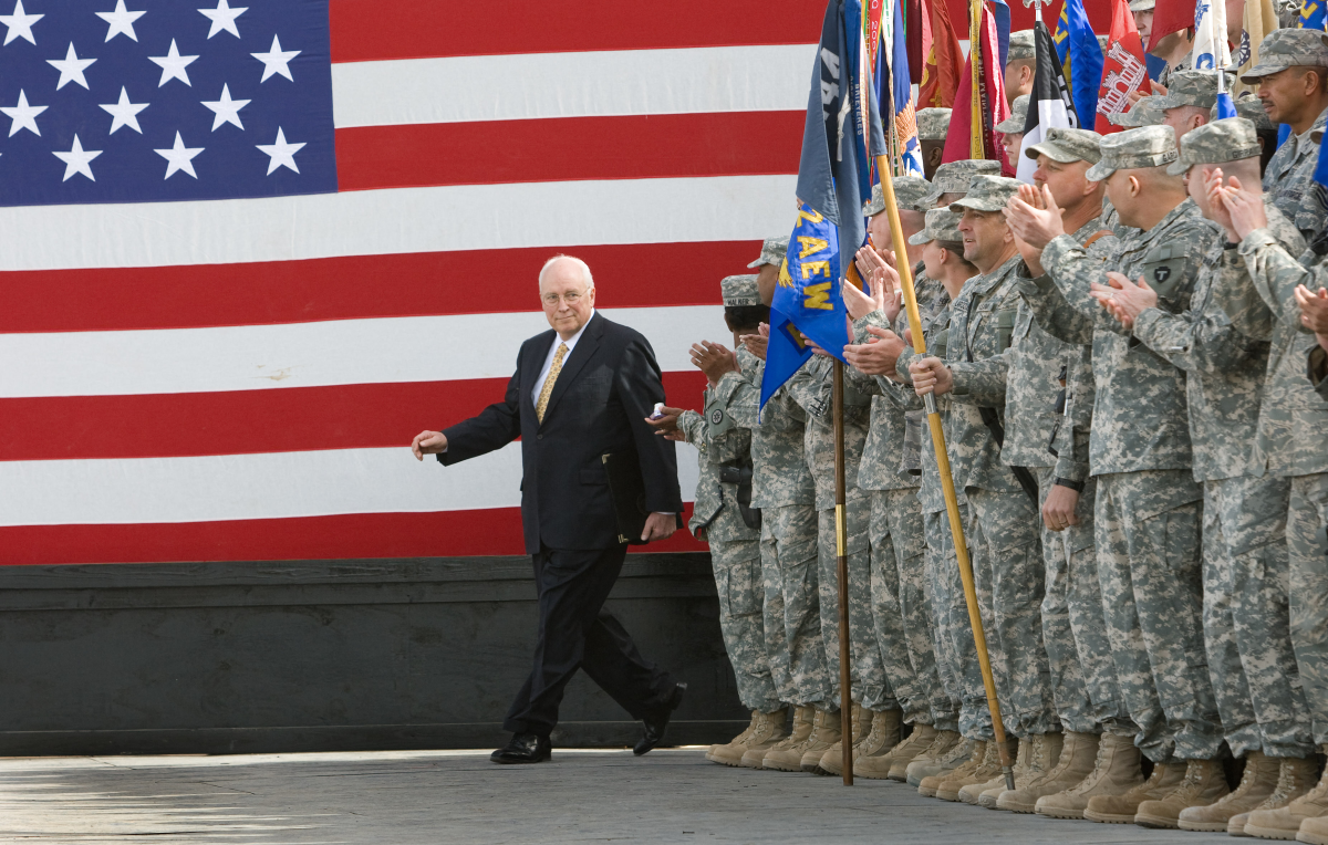 U.S. Vice President Dick Cheney took to the stage in 2008 to deliver remarks to U.S. troops in Iraq. Cheney had previously been CEO of Halliburton, an oil services company that made billions of dollars in Iraq.