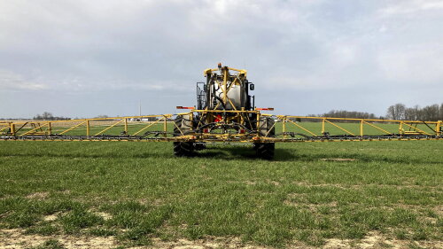 FILE - In this April 5, 2021 file photo, farmer Rick Clifton drives a spray tractor across one of his fields, applying herbicide to cover crops that occupied the ground during fall and winter in Orient, Ohio.