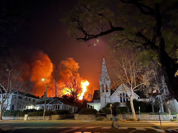 Fire and smoke visible in the city of Sierra Madre, Calif., Tuesday night.