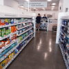 Retail medications are displayed on shelves at a Walgreens pharmacy store in Deerfield, Ill., Thursday, July 25, 2024. America's drugstores are testing smaller locations and making bigger bets on health care as they adjust to customers who need them less for convenience.