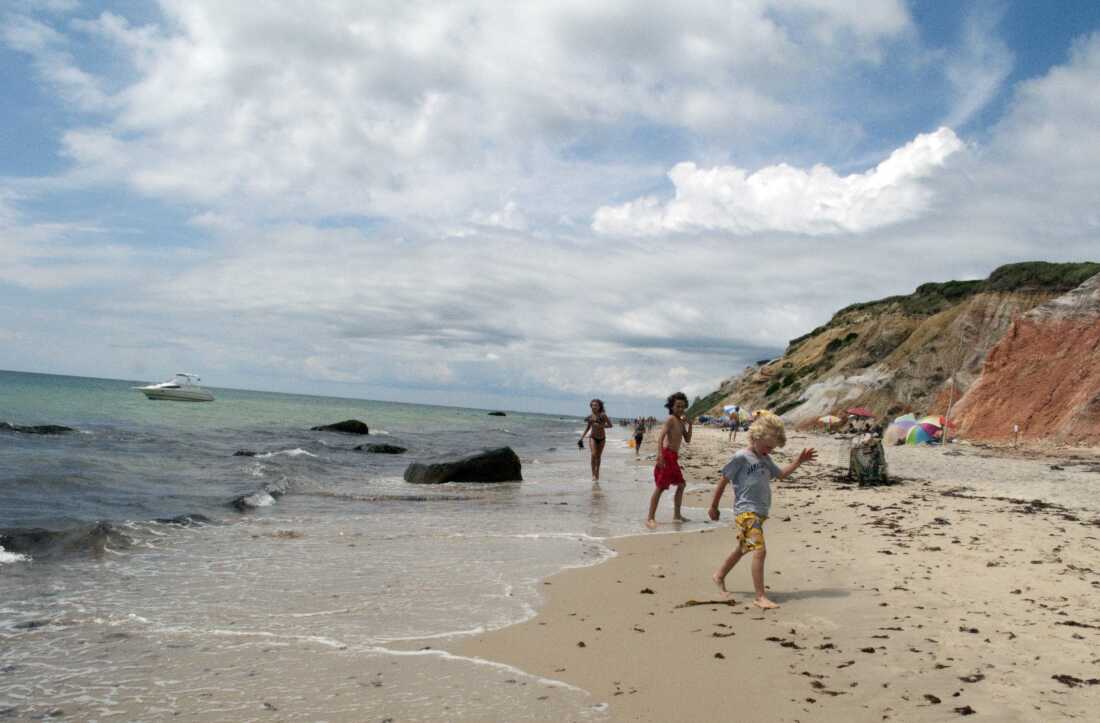 The new book Nothing More of This Land explores the indigenous past and present on Martha's Vineyard. Above, beachgoers on Moshup Beach in July 2010.
