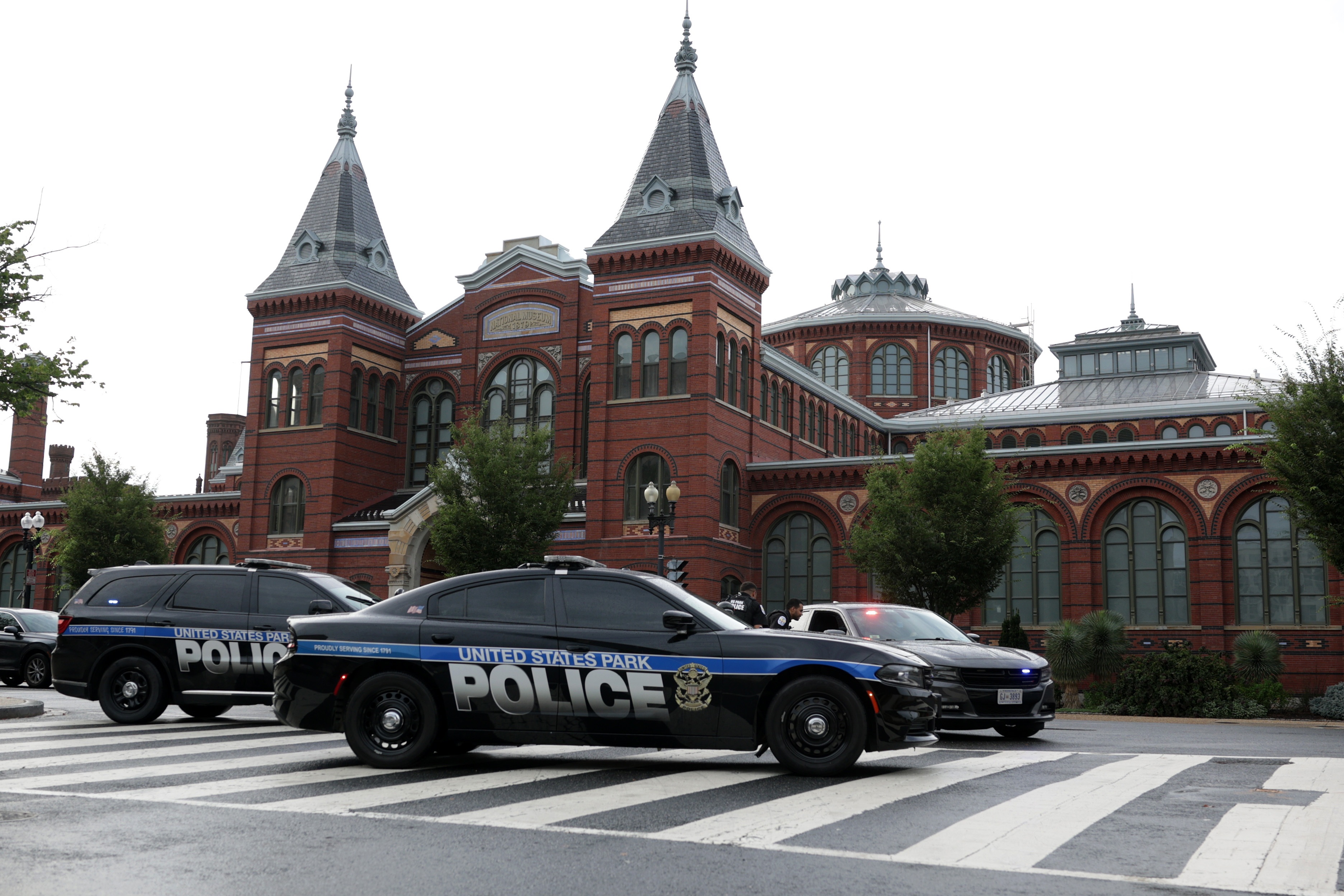 Members of the U.S. Park Police guard an entrance to the 9th Street tunnel in front of the Smithsonian Castle on Aug. 13, 2025, in Washington, D.C., after the Trump administration initiated a federal takeover of D.C. police and deployed the National Guard in the city.