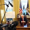 President Trump speaks to the press next to a map of the "Gulf of America" in the Oval Office of the White House on March 26. The administration has denied the Associated Press access to some news events because it uses the term "Gulf of Mexico."