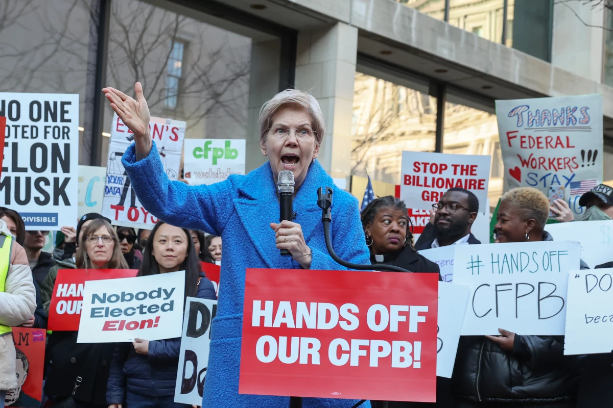 Sen. Elizabeth Warren (D-Mass) speaks as Congressional Democrats and CFPB workers hold a rally to protest the closing of the Consumer Financial Protection Bureau (CFPB) and the work-from-home order issued by CFPB Director Russell Vought outside its headquarters on Feb. 10, 2025 in Washington, DC.