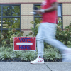 A person walks past a voting sign at the East Point Library on the first day of early voting on October 13, 2026 in Atlanta, Georgia. Early voting will run from October 13th- 30th with Election Day taking place on November 3rd.
