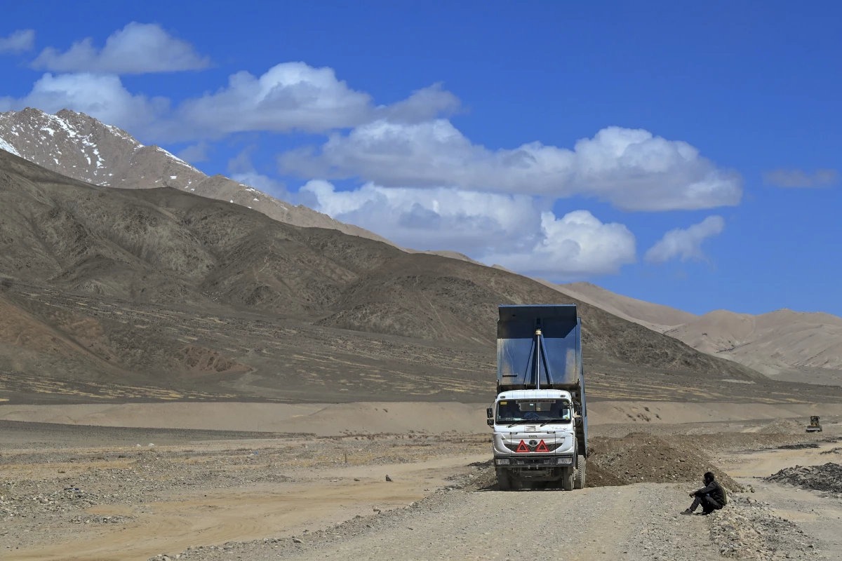 Workers with India's Border Road Organisation construct a road near Demchok, in Ladakh, on May 19, 2024.