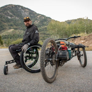 Marshall Evans next to his adaptive bike after riding Canyon Rim Trail at Snowbasin Resort, Sept. 10, 2026.