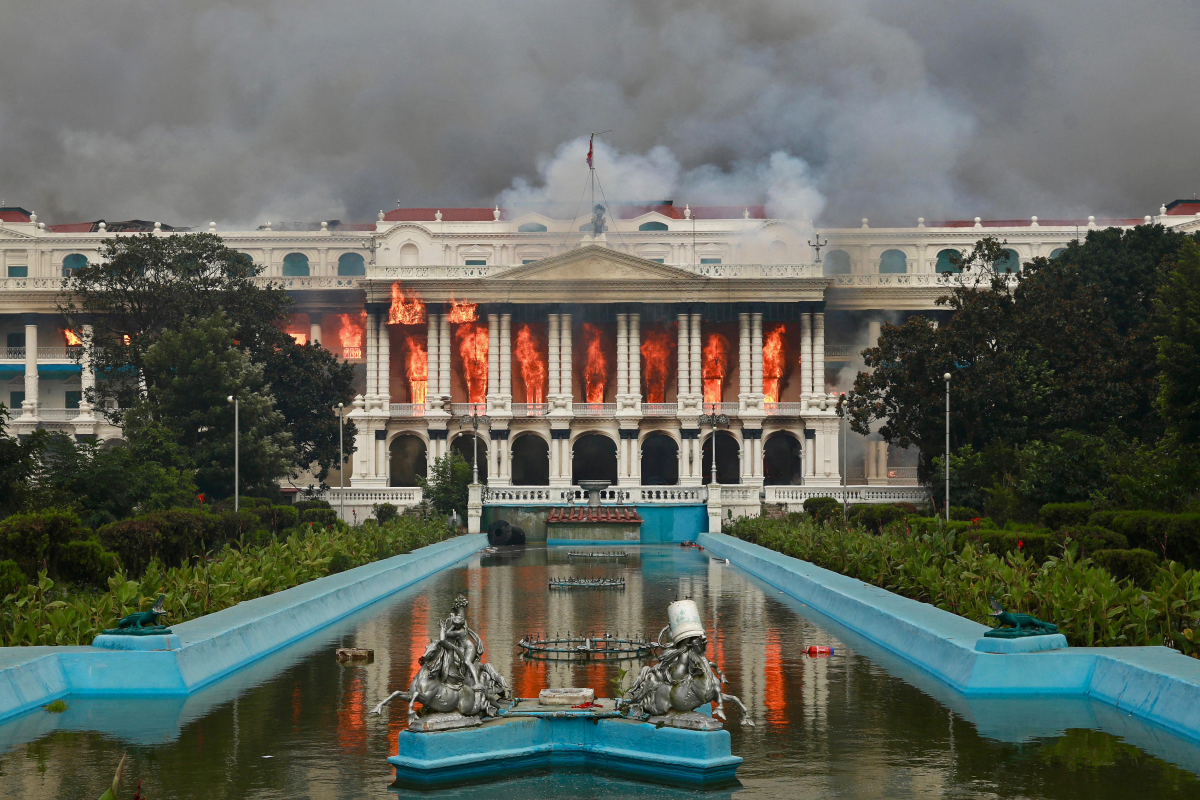 Fire rages through the Singha Durbar, the main administrative building for the Nepal government, in Kathmandu, on Sept. 9, a day after a police crackdown on demonstrations over social media prohibitions and corruption.