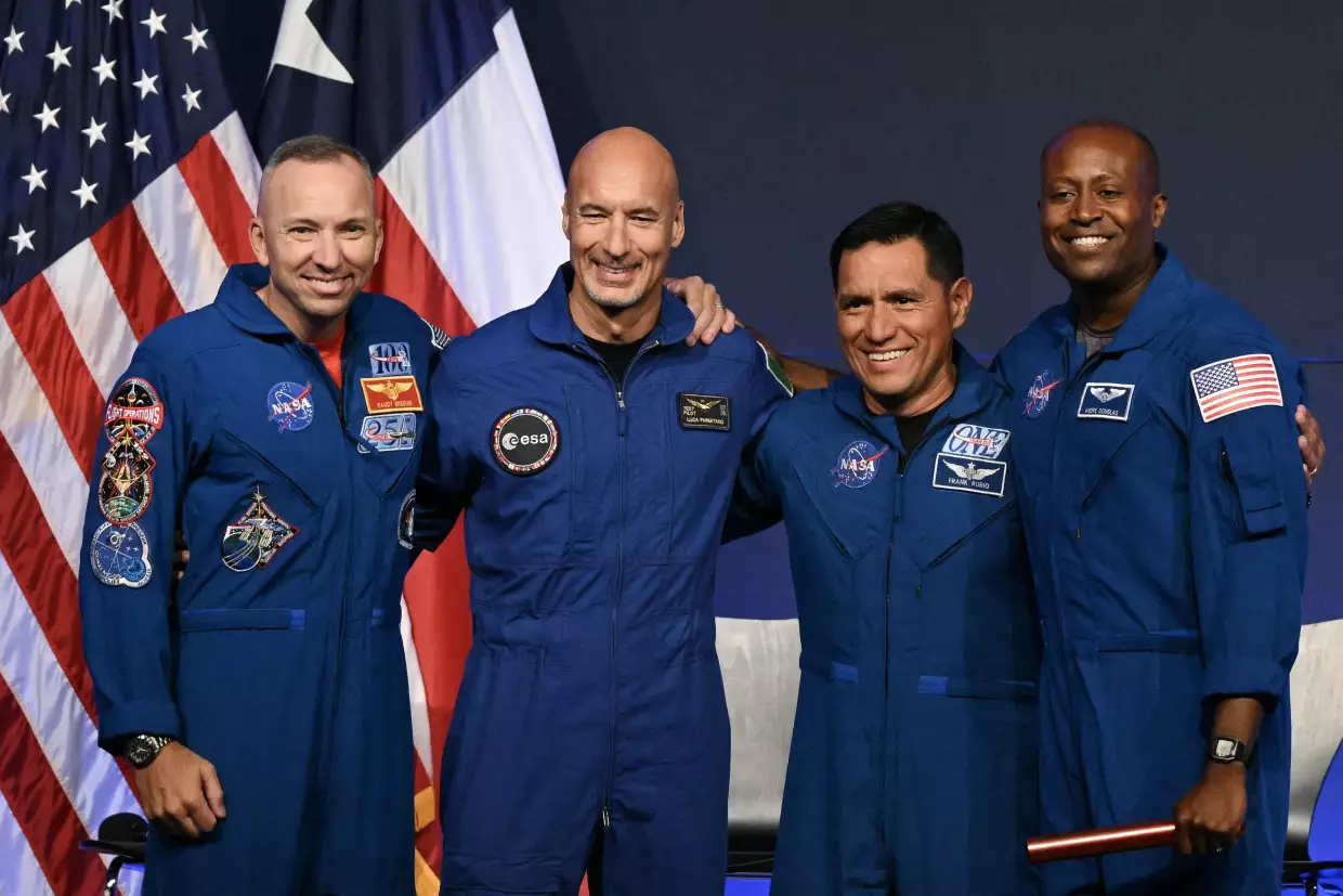 NASA introduced the four astronauts scheduled to fly on next year's Artemis III mission. (From left to right) NASA commander Randy Bresnik, European Space Agency pilot Luca Parmitano, NASA mission specialists Frank Rubio and Andre Douglas at a press conference announcing the crew at NASA's Johnson Space Center in Houston, Texas, on Tuesday.