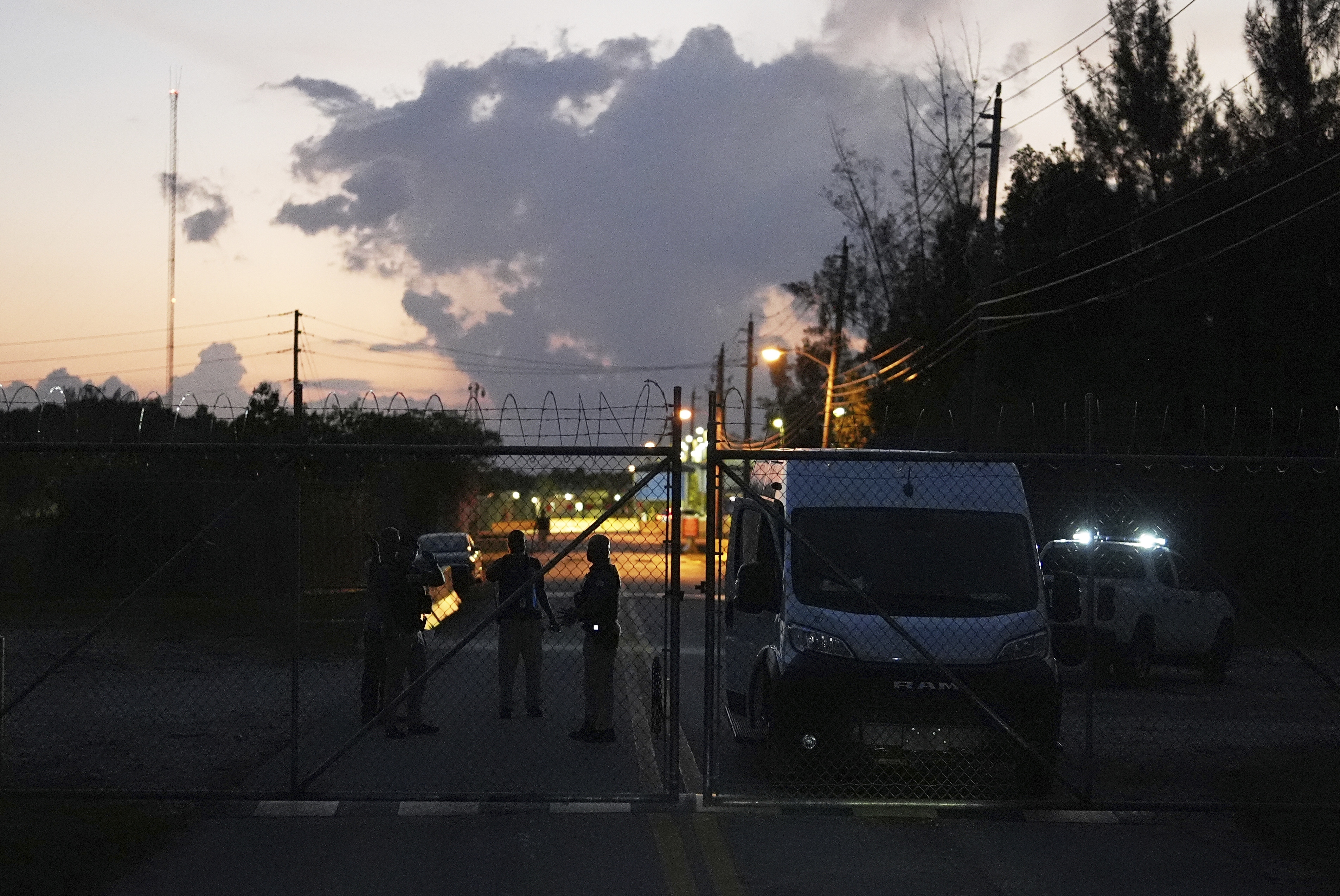 Krome Detention Center officers man a gate leading to the U.S. Immigration and Customs Enforcement facility, May 24, 2025, in Miami. (AP)