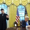 President Donald Trump listens as Elon Musk speaks in the Oval Office at the White House, Tuesday, Feb. 11, 2025, in Washington. (Photo/Alex Brandon)