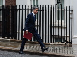 Secretary of State for Foreign, Commonwealth and Development Affairs Ed Miliband arrives in the British government building on Downing Street to attend a weekly Cabinet meeting in London on Tuesday.