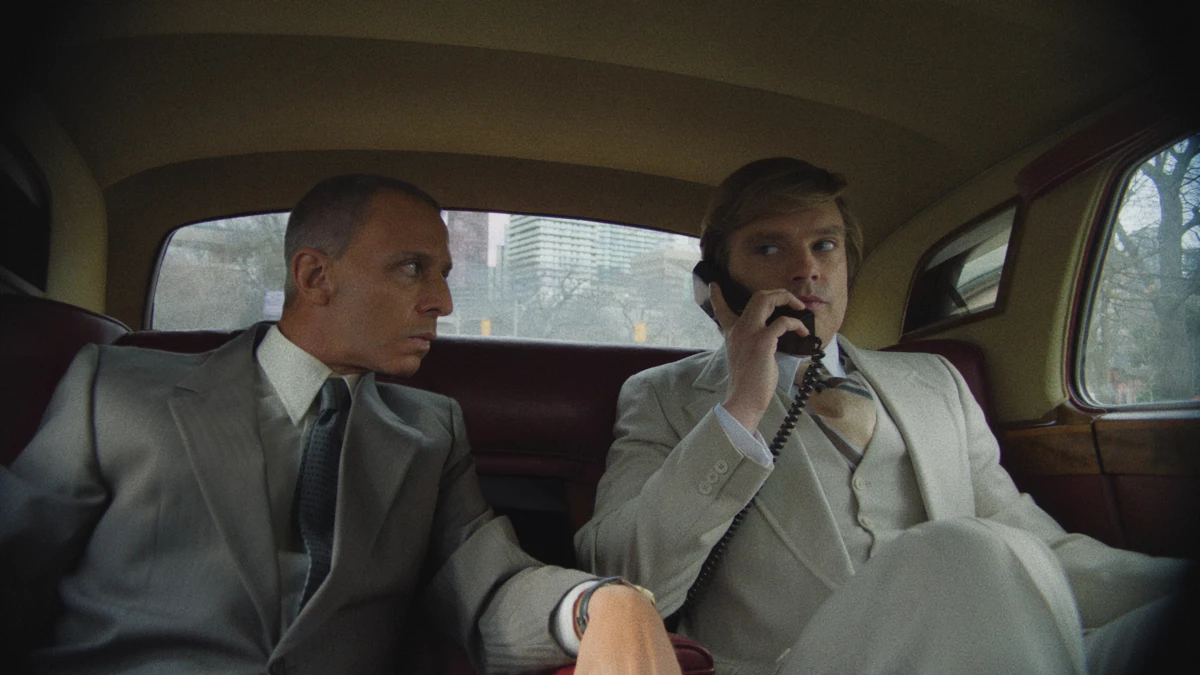 Jeremy Strong (left) as Roy Cohn and Sebastian Stan (right) as Donald Trump appear in Ali Abbasi's film The Apprentice.