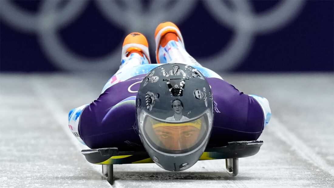 Ukraine's Vladyslav Heraskevych starts for a men's skeleton training session at the 2026 Winter Olympics, in Cortina d'Ampezzo, Italy, Wednesday.