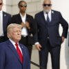 Republican presidential nominee, former President Donald Trump looks on during a wreath laying ceremony at the Tomb of the Unknown Soldier at Arlington National Cemetery on August 26, 2024 in Arlington, Virginia.