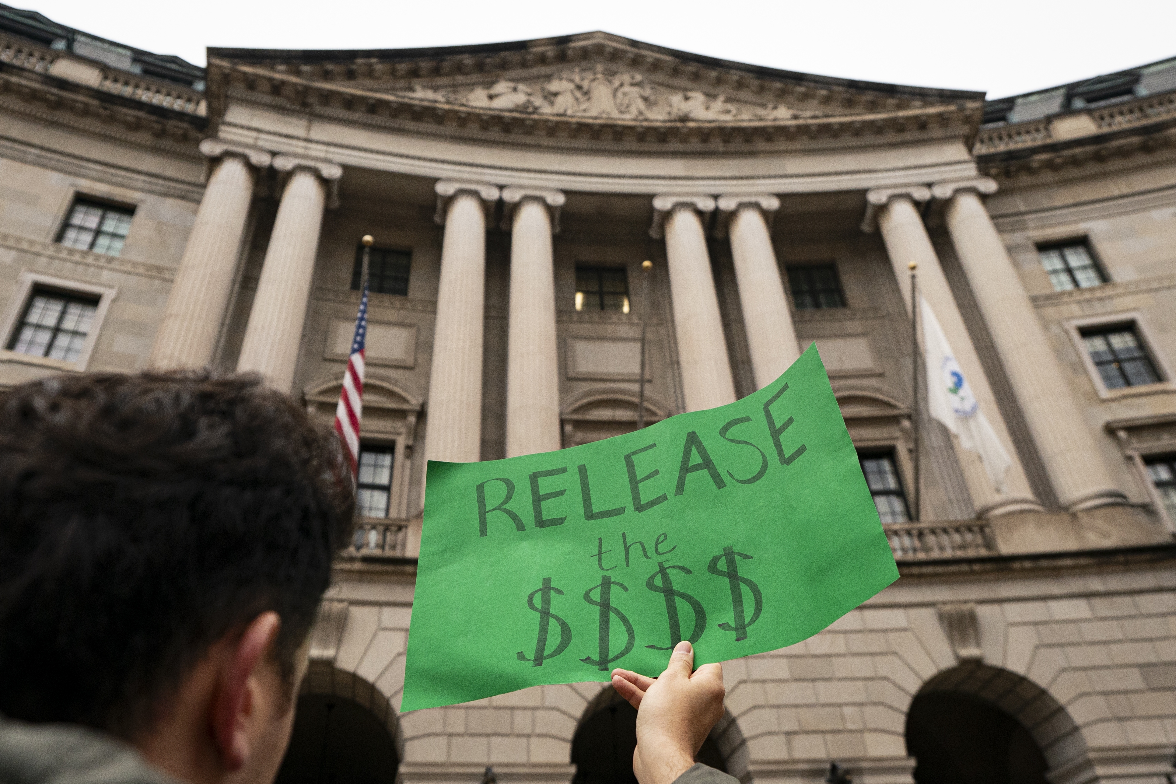 A demonstrator shows opposition during a demonstration at the Environmental Protection Agency on Feb. 6 in Washington, DC.