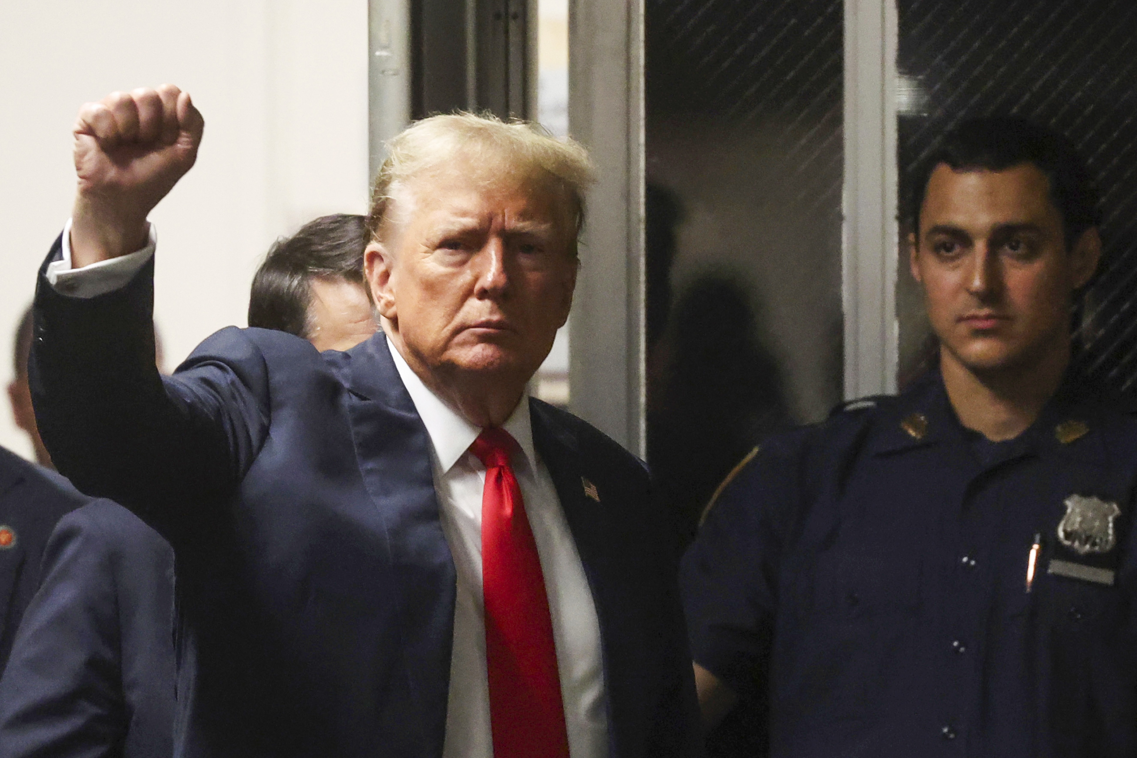 President Trump, shown at Manhattan criminal court in New York, May 28, 2024, before he was re-elected, reacts as he walks back into the courtroom after a break during closing arguments in his hush money trial.