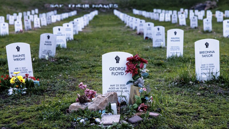Headstones bearing the names of people killed by law enforcement stand in the “Say Their Names” cemetery, a grassroots art installation created by two University of Pennsylvania students. Located just blocks from the George Floyd Memorial in South Minneapolis, the exhibit honors lives lost and calls for justice. Photographed on Saturday, May 10, 2025, in Minneapolis, Minn.