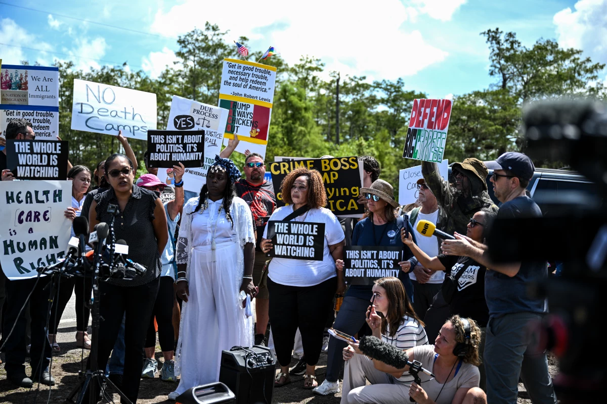 Protesters gather to demand the closure of the immigrant detention center known as 'Alligator Alcatraz' at the Dade-Collier Training and Transition Airport in Ochopee, Fla., on July 22, 2025.