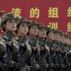 Female soldiers from the People's Liberation Army stand in formation as they practice for an upcoming military parade to mark the 80th Anniversary of the end of World War II and Japan's surrender, at a military base on August 20, 2025 in Beijing, China. The parade will be held on September 3rd, and marks what is known in China as the Chinese People's War of Resistance Against Japanese Aggression and the World Anti-Fascist War. (Photo by Kevin Frayer/Getty Images)