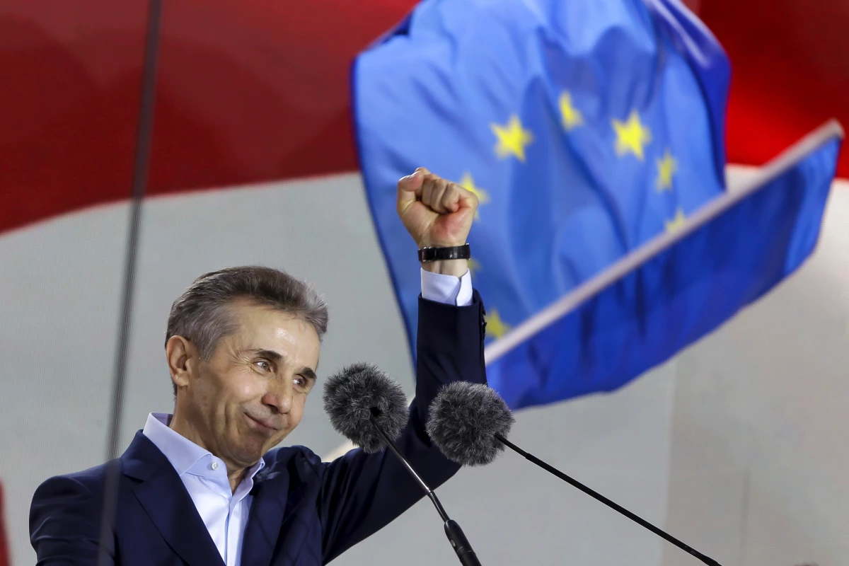 Billionaire Bidzina Ivanishvili, leader of the Georgian Dream party, greets demonstrators during a rally in Tbilisi, Georgia, on April 29.